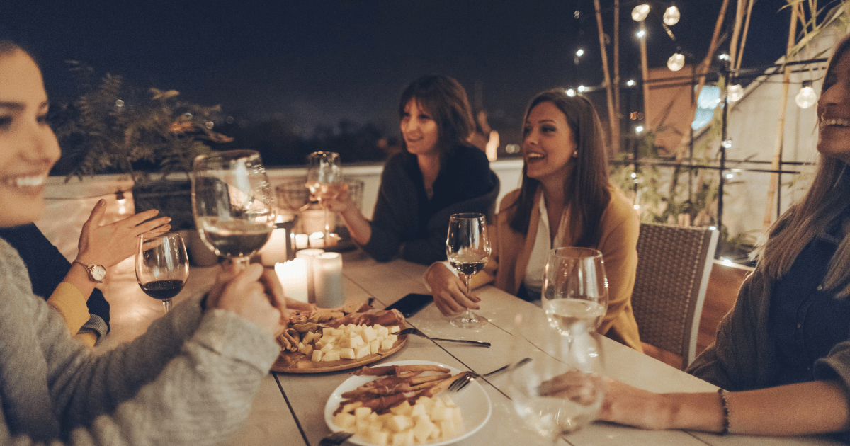 young single women have a night out with food and drinks